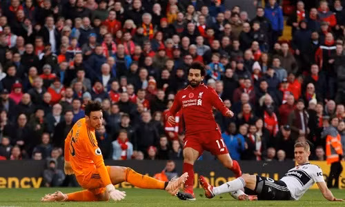 Salah trừng phạt Fulham trong một pha phản công chớp nhoáng. Đây là bàn thứ 6 của tiền đạo người Ai Cập tại Ngoại hạng Anh mùa này. Ảnh: Reuters.