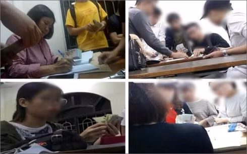 Cảnh đóng tiền "chống trượt" tại khoa Ngoại ngữ của Đại học Công nghiệp Hà Nội (ảnh cắt từ clip)