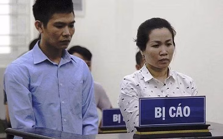  Hai bị cáo Đào Văn Tùng và Đỗ Thị Bích Hằng tại tòa. Ảnh: Tiền Phong