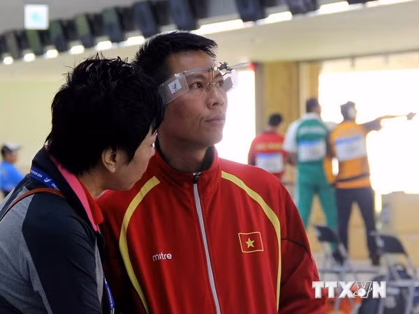 Xạ thủ Trần Quốc Cường của đội tuyển bắn súng Việt Nam tại ASIAD 17. (Ảnh: Hữu Quý/TTXVN)