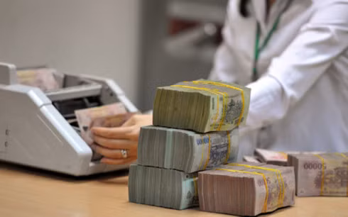 Nhiều đại biểu Quốc hội quan tâm tới việc đảm bảo quyền lợi của người gửi tiền trong trường hợp ngân hàng phá sản (Ảnh minh họa: KT)