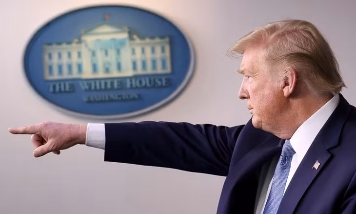 Tổng thống Mỹ Donald Trump tại buổi họp báo về Covid-19 ở Nhà Trắng hôm 16/3. Ảnh: AFP.
