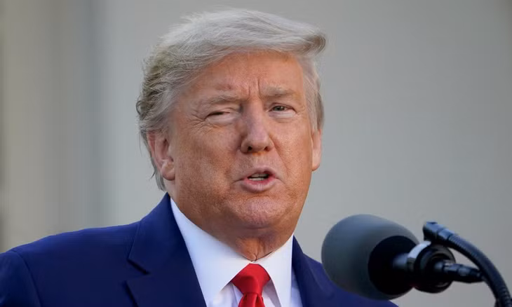 Tổng thống Trump trong cuộc họp báo tại Nhà Trắng hôm 30/3. Ảnh: AFP.