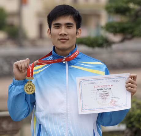 VĐV Nguyễn Thái Linh (ảnh chụp Nguyễn Thái Linh đoạt HCV hạng cân 60kg tại Đại hội TDTT toàn quốc lần thứ 7 - 2014 tại TP Nam Định)