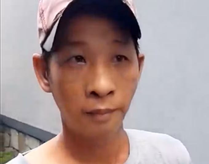 Việt lúc bị cơ quan điều tra bắt. Ảnh: Quốc Thắng.