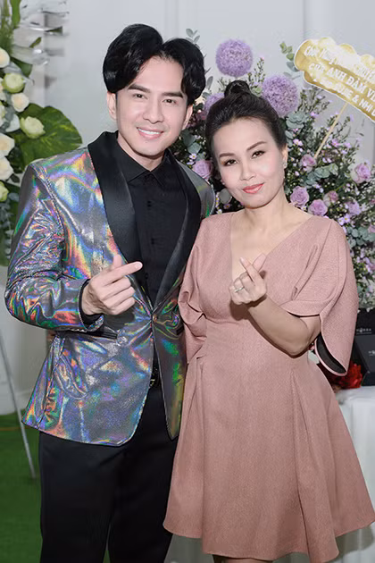 Đan Trường, Cẩm Ly hội ngộ trong sự kiện ra mắt album của Đàm Vĩnh Hưng hồi tháng 7 tại TP HCM. Ảnh: Hữu Khoa.