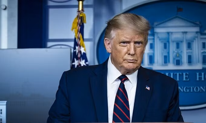 Tổng thống Trump tại cuộc họp báo về quyết định của FDA tại Nhà Trắng ngày 23/8. Ảnh: AFP.