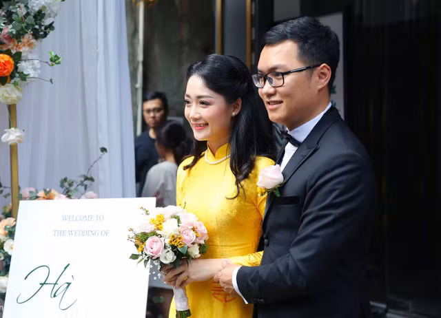 BTV Thu Hà và chồng.