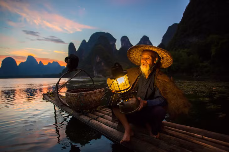  Tại Quế Lâm, sông Li là cội nguồn phát triển du lịch của địa phương. Dọc con sông này là rất nhiều danh lam thắng cảnh nổi tiếng trong và ngoài Trung Quốc. Ảnh: Andy Beales, Bobby Joshi.