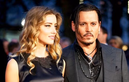 Anh trượt dài với rượu, kiện tụng sau khi ly hôn Amber Heard