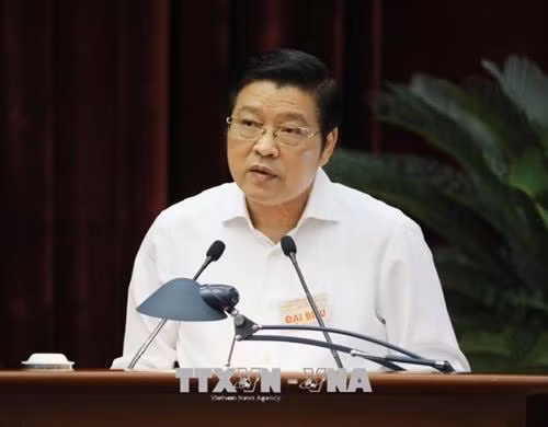 Đồng chí Phan Đình Trạc, Bí thư Trung ương Đảng, Phó Trưởng Ban Thường trực Ban Chỉ đạo Trung ương về phòng, chống tham nhũng, Trưởng Ban Nội chính Trung ương trình bày Báo cáo tóm tắt tình hình, kết quả công tác phòng, chống tham nhũng từ đầu nhiệm kỳ Đại hội XII của Đảng đến nay, phương hướng nhiệm vụ thời gian tới. Ảnh: Phương Hoa/TTXVN