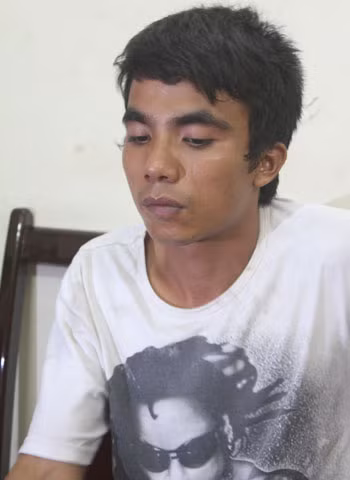 Thanh bị bắt giữ tại cơ quan điều tra. Ảnh: VD