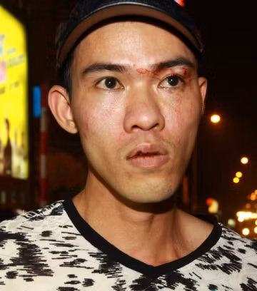 Đối tượng Nguyễn Quang Huy, người mang súng Colt trong người.