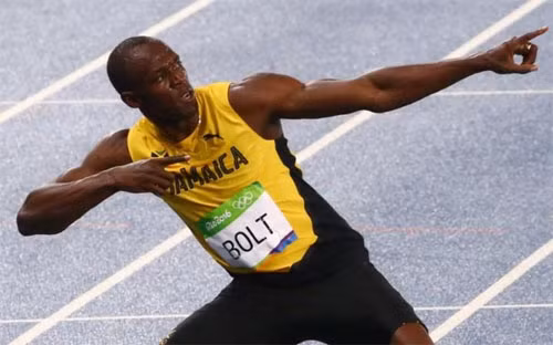 Bolt đã có lần thứ ba liên tiếp vô địch cả hai nội dung chạy 100 m và 200 m tại Olympic. Ảnh: Reuters