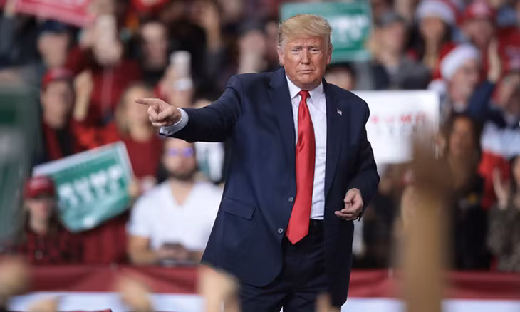 Tổng thống Mỹ Donald Trump trong buổi vận động tranh cử ngày 18/12 tại thành phố Battle Creek, bang Michigan. Ảnh: AFP.