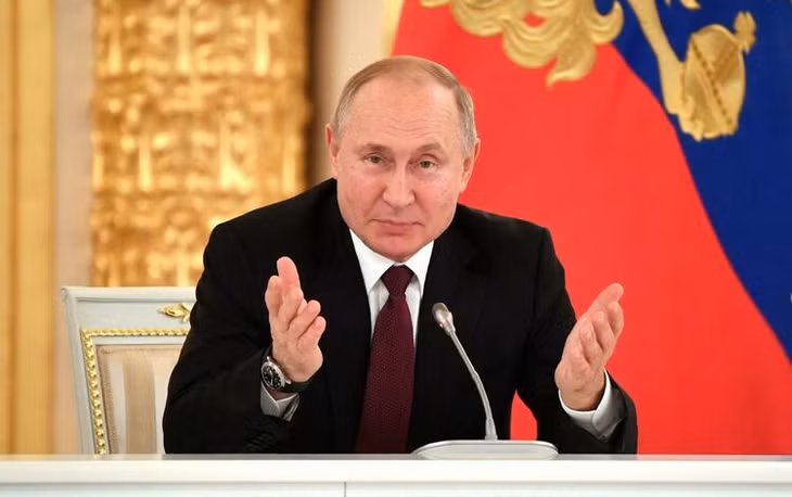 Tổng thống Nga Vladimir Putin phát biểu trong cuộc họp với cộng đồng doanh nhân tại Điện Kremlin, Moskva hôm 25/12. Ảnh: Reuters.