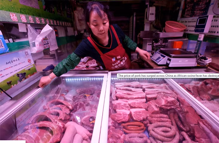 Mộ quầy bán thịt lợn tại Trung Quốc. Ảnh: Reuters