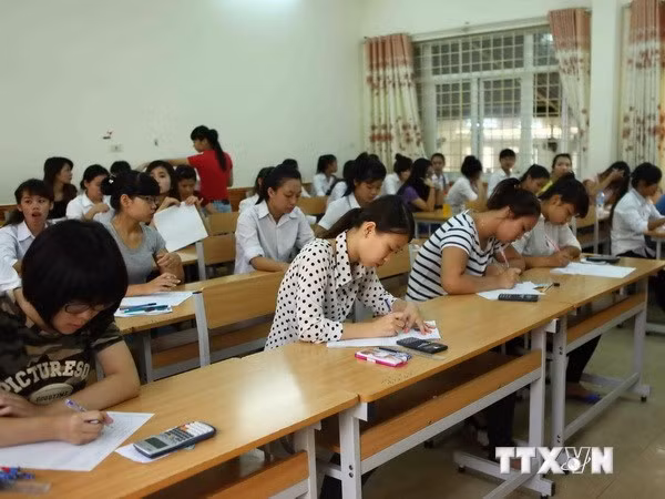 Các thí sinh tham dự kỳ thi Đại học, Cao đẳng năm 2014. (Ảnh: Quý Trung/TTXVN)