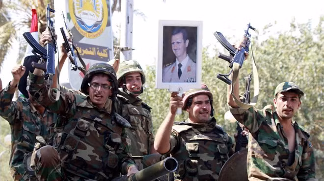 Các binh sĩ quân chính phủ Syria. (Ảnh: ideastream.org)