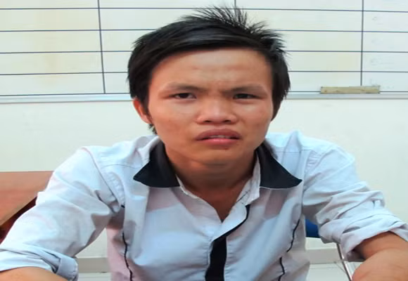 Nguyễn Minh Quân tại cơ quan công an