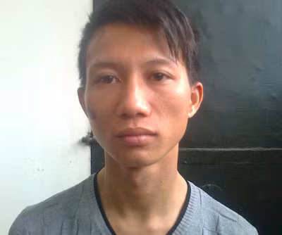 Nguyễn Nam Khánh tại cơ quan điều tra. Ảnh: T.L