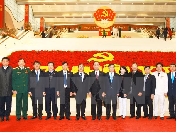Các đại biểu Đảng bộ tỉnh Bình Dương tham dự Đại hội Đảng. (Nguồn: TTXVN)