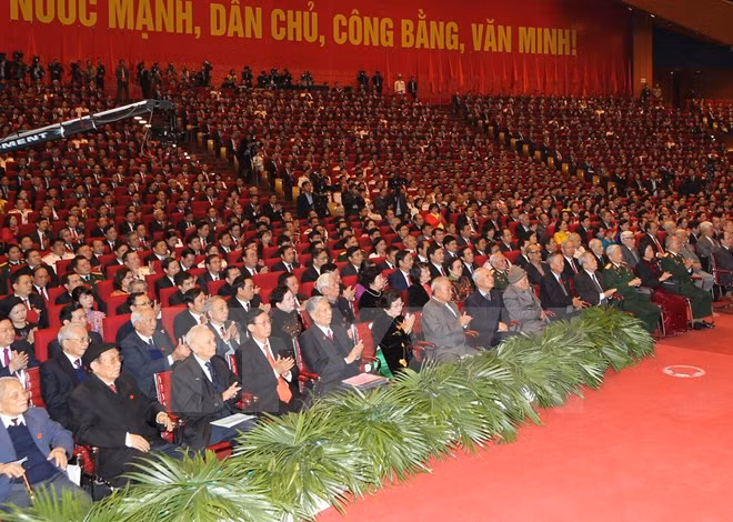  Các đồng chí lãnh đạo, nguyên lãnh đạo Đảng, Nhà nước và các đại biểu tham dự phiên khai mạc Đại hội. (Nguồn: TTXVN) 
