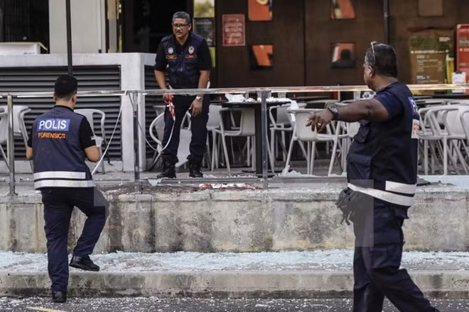 Cảnh sát Malaysia điều tra tại hiện trường một vụ tấn công. (Nguồn: EPA/TTXVN)