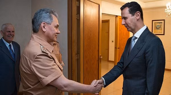 Bộ trưởng Quốc phòng Nga Sergei Shoigu và Tổng thống Syria Bashar al-Assad. (Nguồn: RT)