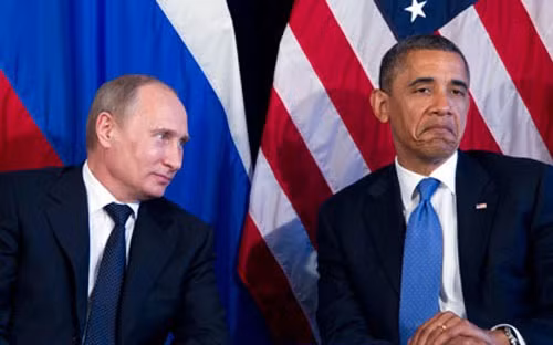 Tổng thống Nga Putin (trái) và người đồng cấp Mỹ Barack Obama - Ảnh: Guardian.