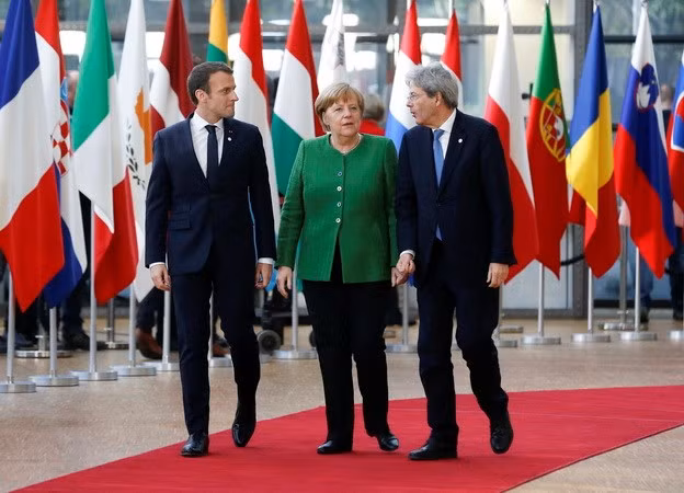 Tổng thống Pháp Emmanuel Macron, Thủ tướng Đức Angela Merkel và Thủ tướng Italy Paolo Gentiloni tại Hội nghị lãnh đạo các nước thành viên EU ở Brussels (Bỉ) ngày 23/2. (Nguồn: THX/TTXVN)
