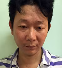 Hưng tại cơ quan công an. Ảnh: Nguyệt Triều.