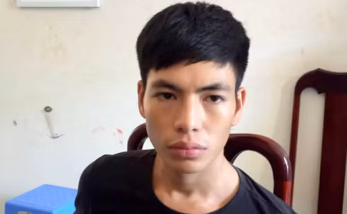 Nguyễn Văn Tuấn tại cơ quan công an. Ảnh: Quang Bình.