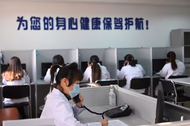 Đường dây nóng tại tỉnh Liêu Ninh. Ảnh: Reuters 