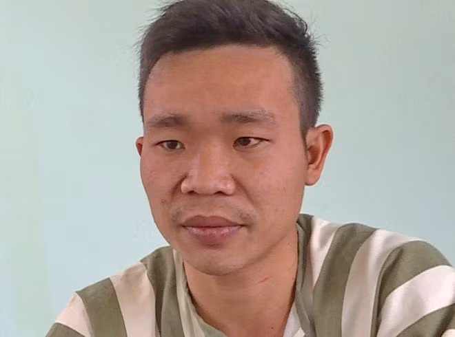  Hung thủ Lê Văn Cường sau khi bị bắt giữ. Ảnh : T.T