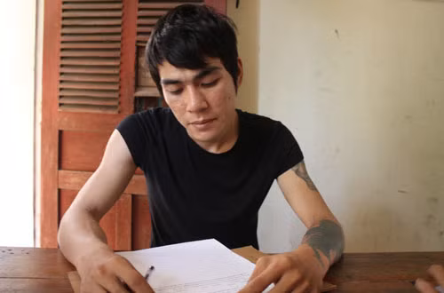 Nguyễn Văn Thành tại cơ quan cảnh sát. Ảnh: Hải Bình.