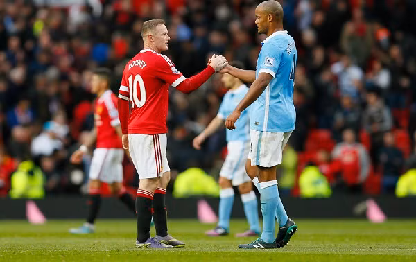 Rooney và Kompany đều có những vấn đề trước trận. Ảnh: Reuters.