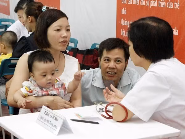 Luật Bảo hiểm xã hội năm 2014 đã bổ sung nhiều chế độ thai sản tốt hơn cho các đối tượng. (Ảnh: TTXVN)