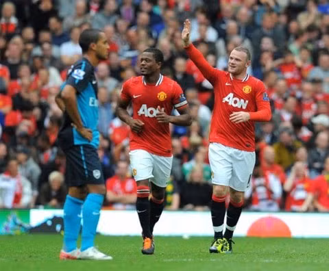 Rooney (phải) vẫn đánh giá cao Arsenal.