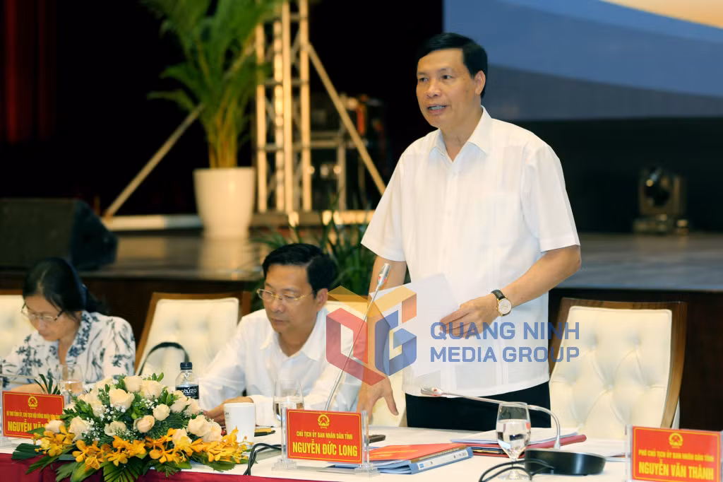 Chủ tịch UBND tỉnh Nguyễn Đức Long trả lời thắc mắc của các doanh nghiệp tại Hội nghị (7-2018). Ảnh: Đỗ Phương