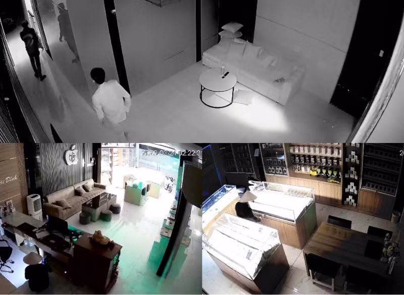 Hình ảnh các đối tượng đột nhập cửa hàng điện thoại bị camera an ninh ghi lại.