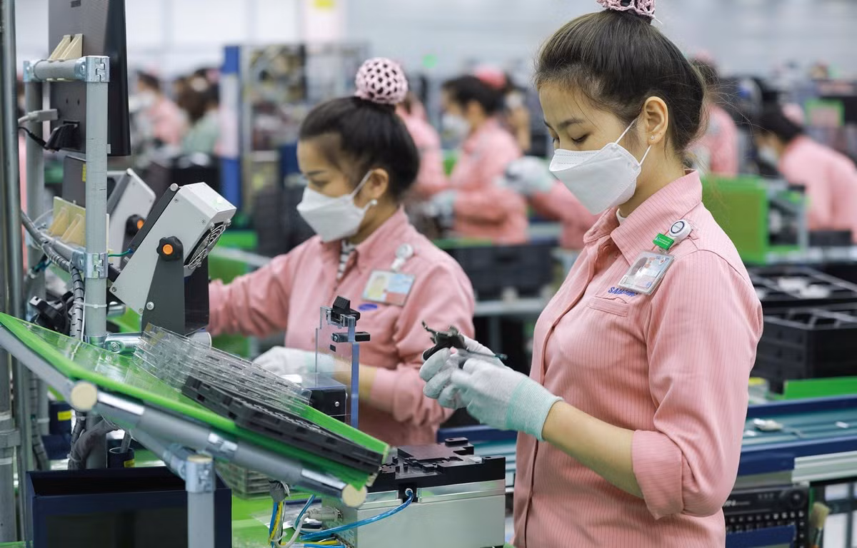 Các biện pháp ưu đãi thuế với nhóm doanh nghiệp FDI lớn tại Việt Nam sẽ không còn nhiều tác dụng khi thực thi thuế tối thiểu toàn cầu. Ảnh: DiLi/Vietnam+