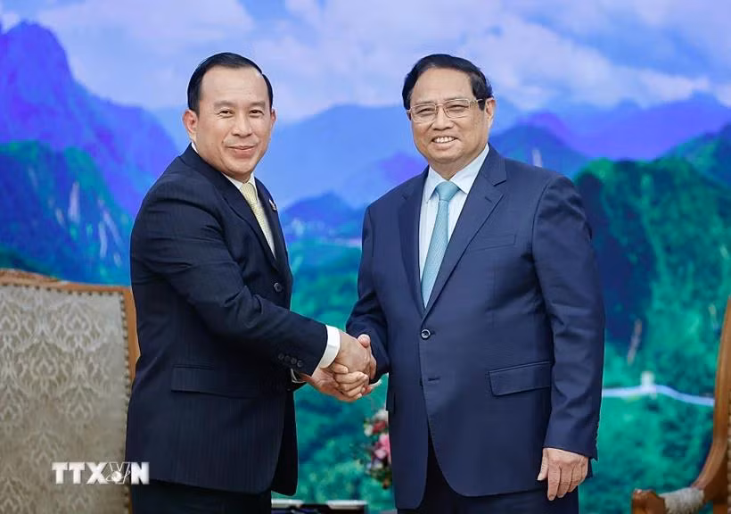 Thủ tướng Phạm Minh Chính tiếp Bộ trưởng Thanh tra Campuchia Huot Hak. (Ảnh: Dương Giang/TTXVN)