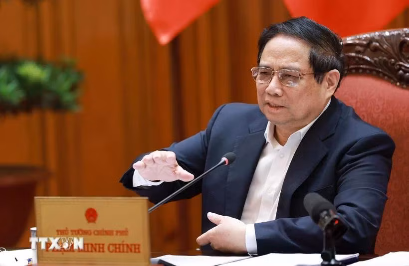 Thủ tướng Phạm Minh Chính, Bí thư Đảng ủy Chính phủ chủ trì cuộc họp. (Ảnh: Dương Giang/TTXVN)