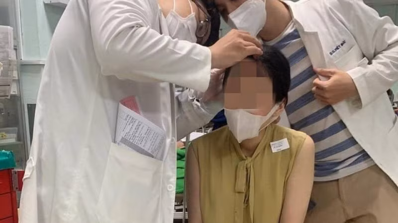 Chị Oanh Lê thời điểm vào bệnh viện để khâu vết thương.