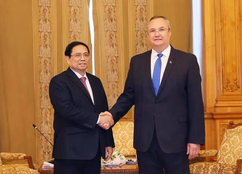 Thủ tướng Phạm Minh Chính hội kiến Chủ tịch Thượng viện Romania Nicolae Ionel Ciuca. (Ảnh: Dương Giang/TTXVN)
