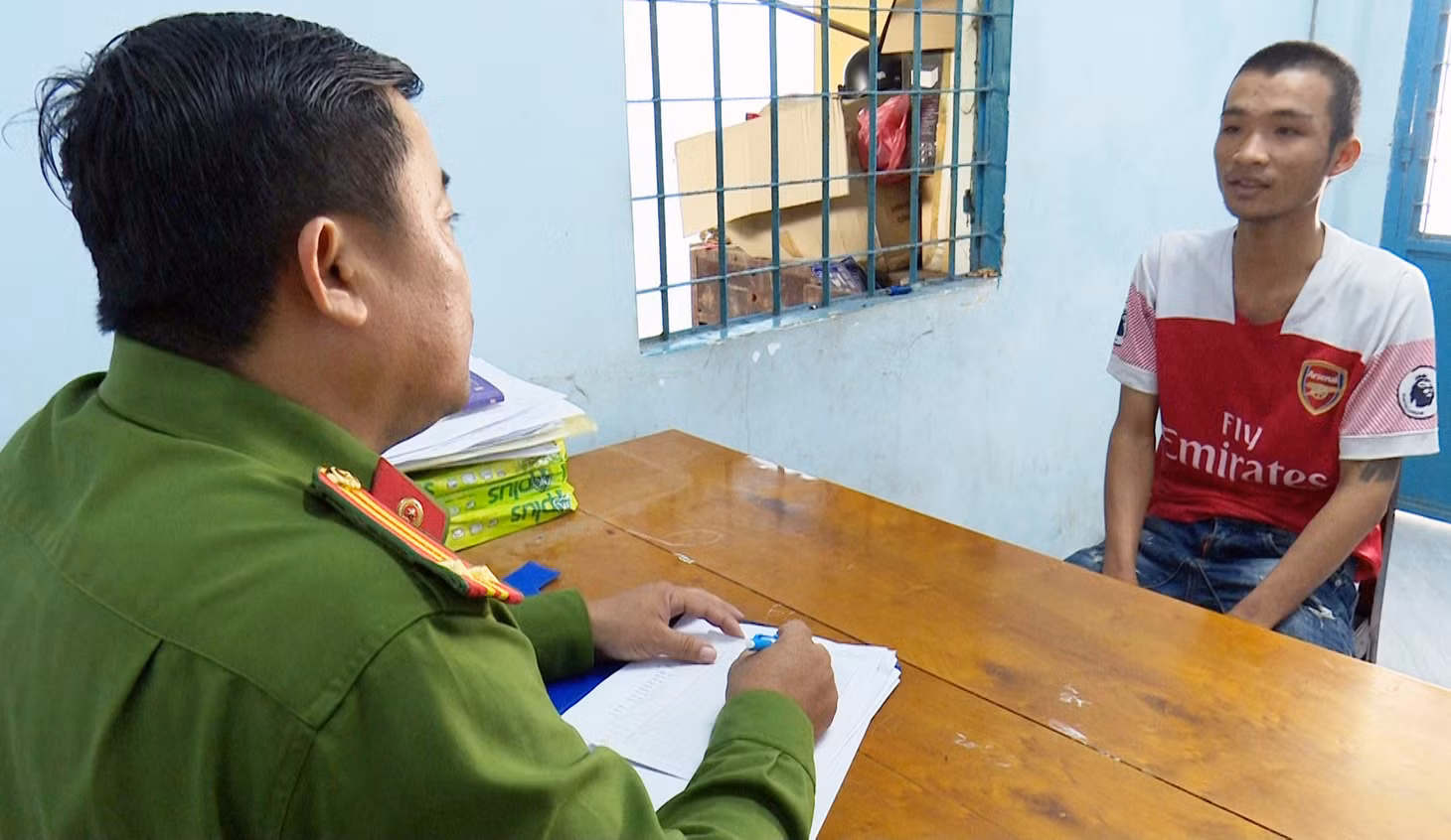 Lê Vinh Lam tại cơ quan công an. Ảnh: Nghiêm Túc.