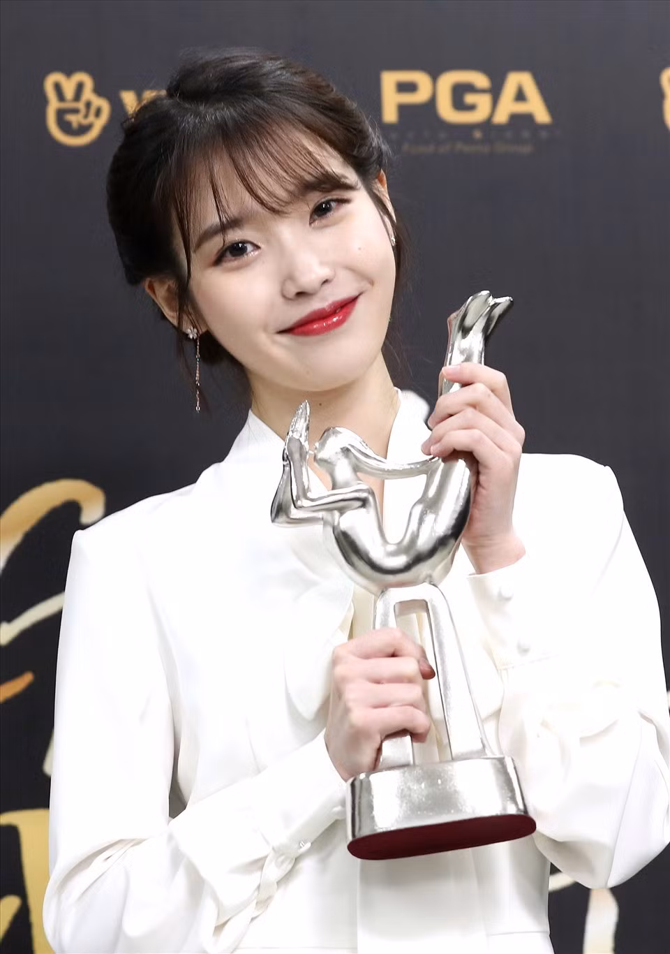IU giành được nhiều giải thưởng âm nhạc lớn nhạc trong suốt 14 năm hoạt động giải trí. Ảnh: Ilgan Sports
