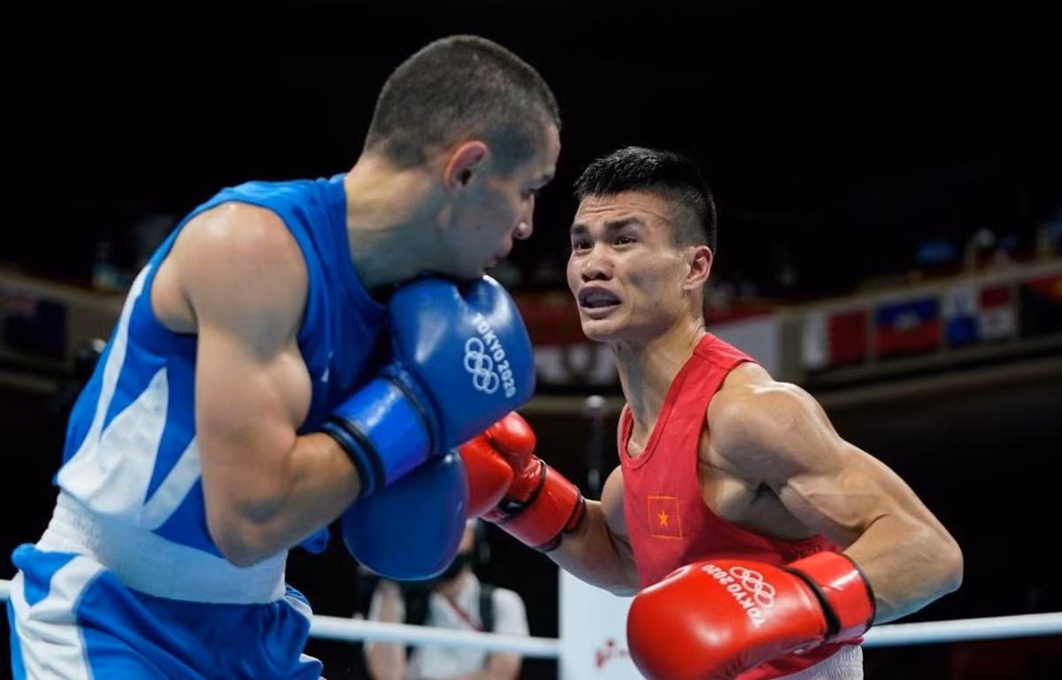 Nguyễn Văn Đương chia tay Olympic Tokyo 2020 với một chiến thắng đầu tiên trước tay đấm người Azerbaijan. (Ảnh: Getty Images)
