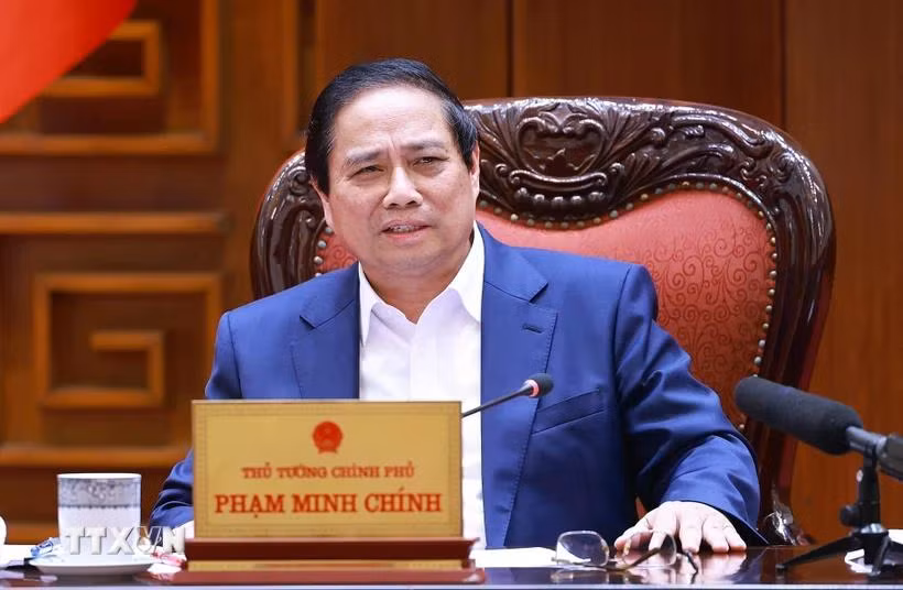Thủ tướng Phạm Minh Chính chủ trì cuộc họp về dự thảo phát triển giáo dục, đào tạo và chăm sóc sức khoẻ nhân dân. (Ảnh: Dương Giang/TTXVN)